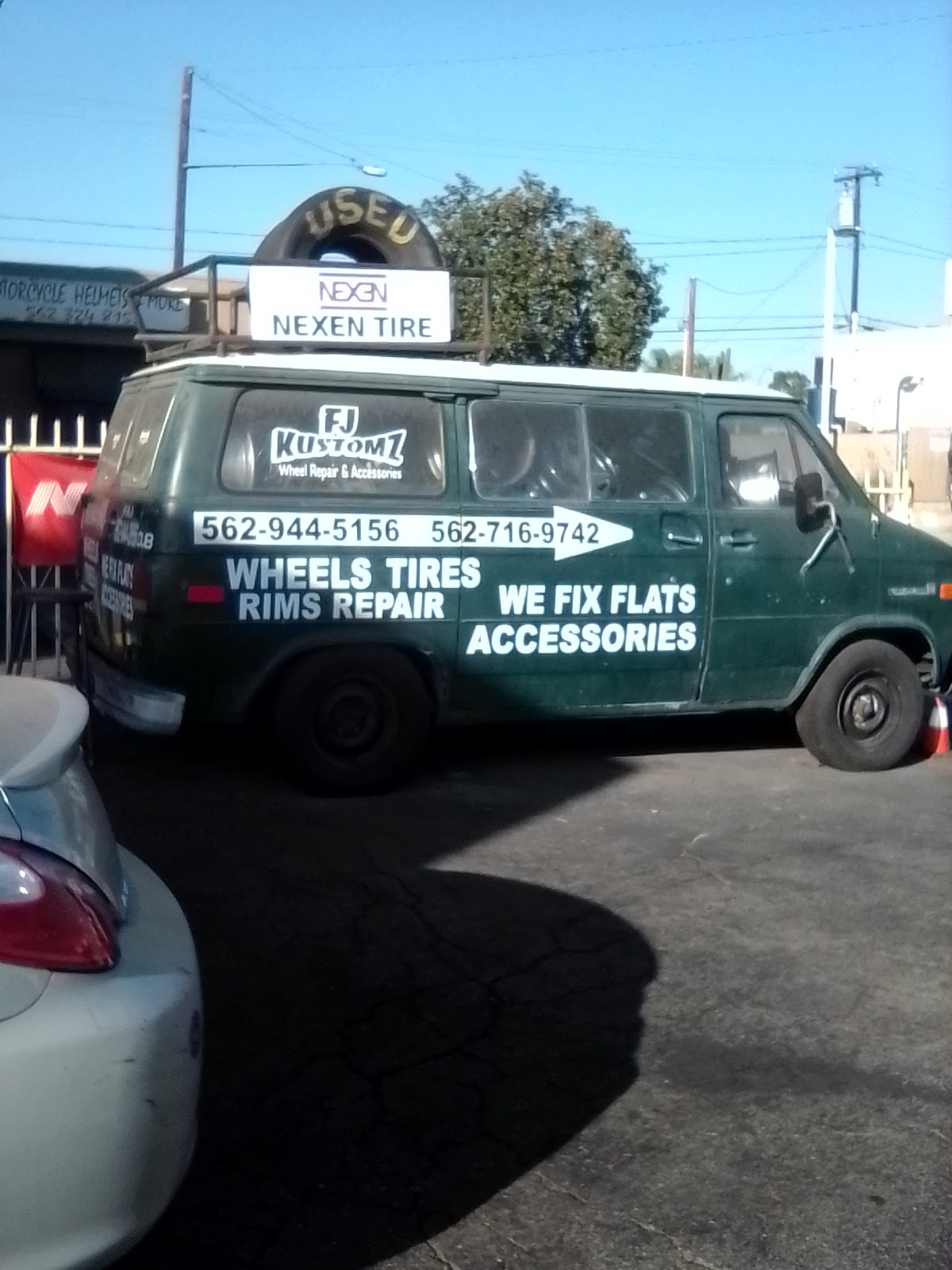 The Rivas shop van listing wheels, tires and rim repair